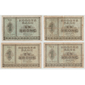 -3- Lott, 4 stk. 1 kroner 1940A-1943F, VK - 1940A, kv. 1-, presset
1941B, kv. 1-/2, rifter, hull.
1942D, kv. 1-, brettehull, rifter 
1943F, kv. 1-, bretterift.
Sign: Meldahl/Nielsen / Numisma Mynthandel A/S: NOK  1,-